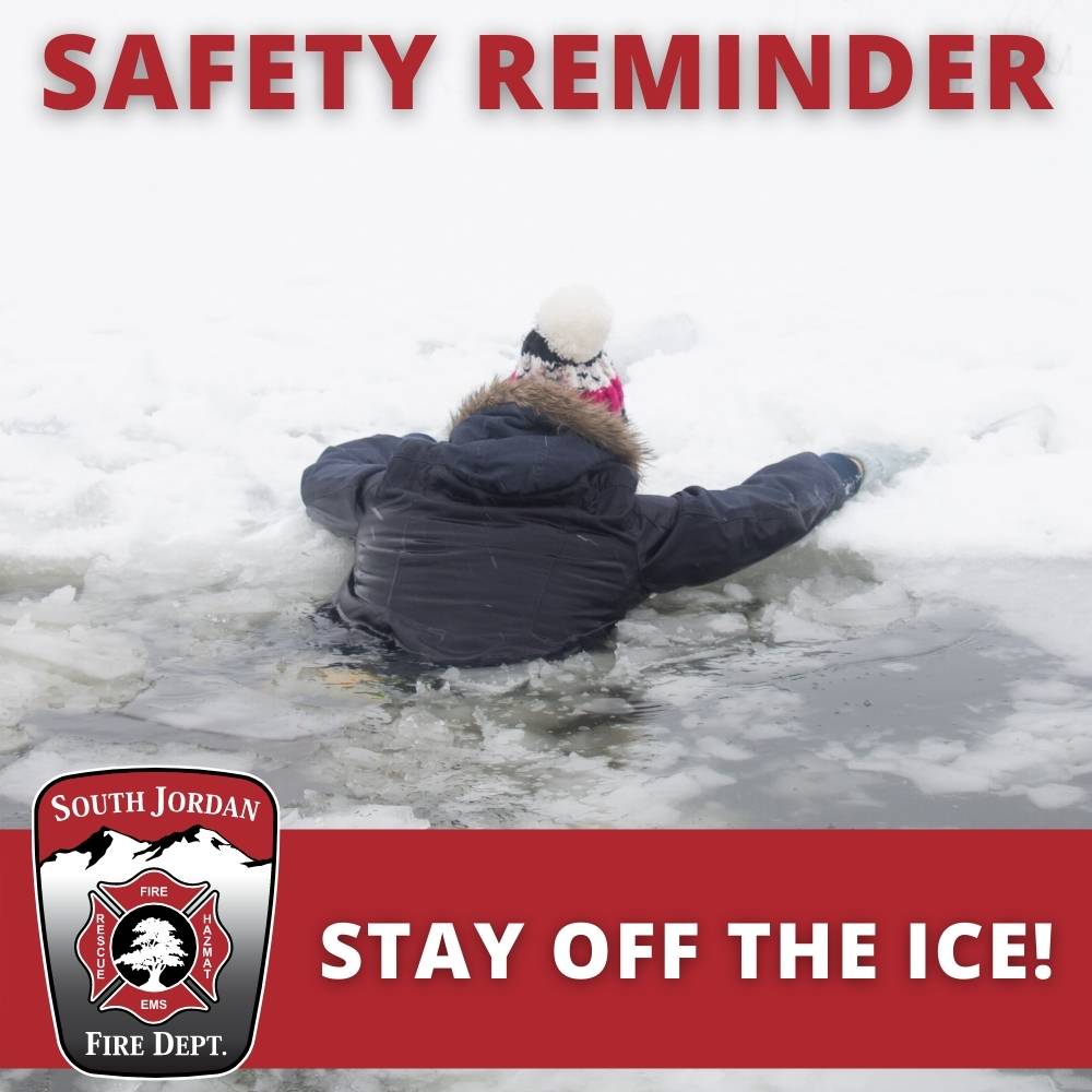 Safety Reminder to Stay off the Ice showing a person that has fallen into a lake through the ice